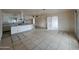 Spacious kitchen and living room with tiled floors and updated features, perfect for modern living at 13805 N 31St Ave, Phoenix, AZ 85053