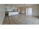 Bright and airy living area that flows into a modern kitchen with island and lots of natural light at 13805 N 31St Ave, Phoenix, AZ 85053