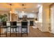 Modern kitchen with stainless steel appliances, granite counters, and white cabinetry at 14407 N 35Th Pl, Phoenix, AZ 85032