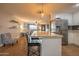 Bright kitchen featuring granite countertop and open concept to living room at 14407 N 35Th Pl, Phoenix, AZ 85032