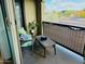 Balcony with comfortable seating and a view of the street at 155 N Lakeview Blvd # 207, Chandler, AZ 85225