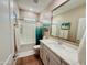 Bright bathroom with a shower-tub combination and granite countertop at 155 N Lakeview Blvd # 207, Chandler, AZ 85225