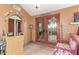 Bright foyer with tile floor, archway and decorative furnishings at 15620 N 19Th St, Phoenix, AZ 85022