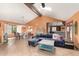 Inviting living room with tile floors, fireplace, skylight and ample natural light at 15620 N 19Th St, Phoenix, AZ 85022