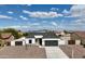Beautiful aerial view of a single story home with a gray roof and desert landscaping at 15901 S Saxon Rd, Arizona City, AZ 85123