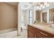 Functional bathroom with a shower and bathtub combination, a large vanity, and good lighting at 16611 E Inca Ave, Fountain Hills, AZ 85268