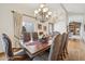 Elegant dining room featuring a chandelier, large table, and ornate chairs at 16611 E Inca Ave, Fountain Hills, AZ 85268