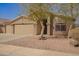 Charming single-story home with three-car garage, desert landscaping and neutral paint at 1756 E Cardinal Dr, Casa Grande, AZ 85122