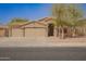 Charming single-story home with three-car garage, desert landscaping and neutral paint at 1756 E Cardinal Dr, Casa Grande, AZ 85122