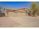 Charming single-story home with three-car garage, desert landscaping and neutral paint at 1756 E Cardinal Dr, Casa Grande, AZ 85122