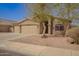 Charming single-story home with three-car garage, desert landscaping and neutral paint at 1756 E Cardinal Dr, Casa Grande, AZ 85122