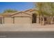 Charming single-story home with three-car garage, desert landscaping and neutral paint at 1756 E Cardinal Dr, Casa Grande, AZ 85122