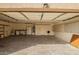 View of garage with attached cabinets, utility sink, washer, dryer, and water heater at 1756 E Cardinal Dr, Casa Grande, AZ 85122