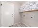 Laundry room with overhead cabinets at 1756 E Cardinal Dr, Casa Grande, AZ 85122