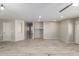 Inviting living room featuring luxury vinyl floors, light grey walls and stylish light fixtures at 1756 E Cardinal Dr, Casa Grande, AZ 85122