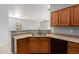 Bright kitchen featuring a stainless steel faucet and black appliances at 18842 N Lariat Rd, Maricopa, AZ 85138