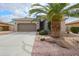 Charming single-story home with a well-maintained front yard, desert landscaping, and a two-car garage at 2509 E Dulcinea Trl, Casa Grande, AZ 85194