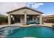 Gorgeous pool with an outdoor lounge area, ideal for entertaining guests in a private backyard setting at 2509 E Dulcinea Trl, Casa Grande, AZ 85194