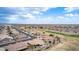 Community aerial view showing the neighborhood layout, green spaces, and proximity to the golf course at 2712 S Tambor --, Mesa, AZ 85209