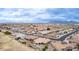 An aerial view of a neighborhood showcasing well-maintained homes and mountain views at 2712 S Tambor --, Mesa, AZ 85209