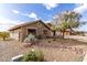 Charming house with a desert-friendly landscaped front yard at 2712 S Tambor --, Mesa, AZ 85209