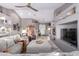 Spacious living room featuring vaulted ceilings, a ceiling fan, recessed lighting, and a neutral color palette at 2712 S Tambor --, Mesa, AZ 85209