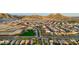 Scenic aerial view of the Primary-planned community featuring mountain views and desert landscaping at 27280 N 74Th Ln, Peoria, AZ 85383