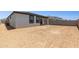 Side view of home with covered patio and spacious backyard, waiting for your design ideas at 27288 N 74Th Ln, Peoria, AZ 85383