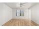 Bedroom featuring hardwood floors, a window, and neutral-colored walls at 28617 N 50Th Pl, Cave Creek, AZ 85331