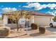 Charming single-story home with a well-maintained front yard and a two-car garage at 28617 N 50Th Pl, Cave Creek, AZ 85331