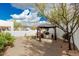 This backyard features a gazebo with an outdoor kitchen at 28617 N 50Th Pl, Cave Creek, AZ 85331