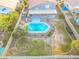 Aerial view of backyard with pool, patio, and landscaped yard at 31446 N Candlewood Dr, San Tan Valley, AZ 85143