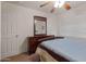 Bedroom with a ceiling fan and a wood framed dresser at 31446 N Candlewood Dr, San Tan Valley, AZ 85143