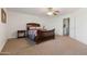 Bedroom featuring a ceiling fan and neutral carpeting at 31446 N Candlewood Dr, San Tan Valley, AZ 85143