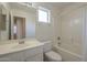 Full bathroom featuring a tub/shower combo, vanity, and tiled flooring at 3313 E Waltann Ln, Phoenix, AZ 85032