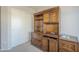 The office features a built in desk and shelving with sliding closet doors to the left at 3313 E Waltann Ln, Phoenix, AZ 85032