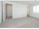 Bedroom featuring neutral carpet and an open floorplan at 40218 N Alegre Dr, San Tan Valley, AZ 85140