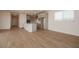 Open-concept kitchen with stainless steel appliances and island at 40218 N Alegre Dr, San Tan Valley, AZ 85140