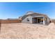 Large backyard featuring a patio, perfect for outdoor entertaining and relaxation at 40531 W Michaels Dr, Maricopa, AZ 85138