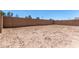 Expansive, empty backyard ready for landscaping and personalization at 40531 W Michaels Dr, Maricopa, AZ 85138