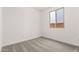 Bedroom features neutral carpet, a window and white walls offering a peaceful space at 40531 W Michaels Dr, Maricopa, AZ 85138