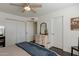 Bright bedroom with a ceiling fan, a dresser, and a closet, offering a cozy retreat at 4832 E Mineral Rd # 5, Phoenix, AZ 85044