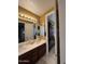 Bathroom vanity featuring double sinks and a large mirror at 5426 E Calle De Baca --, Cave Creek, AZ 85331