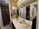 Bathroom vanity featuring double sinks and a large mirror at 5426 E Calle De Baca --, Cave Creek, AZ 85331