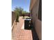 Practical side yard with HVAC units surrounded by desert landscaping, providing efficient functionality with aesthetic appeal at 5426 E Calle De Baca --, Cave Creek, AZ 85331