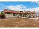 Expansive backyard featuring a covered patio, perfect for outdoor relaxation and entertainment at 5658 E Fairbrook St, Mesa, AZ 85205