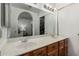 Spacious main bathroom features dual sinks and mirrors at 5658 E Fairbrook St, Mesa, AZ 85205