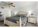 Comfortable bedroom with ceiling fan and stylish furnishings at 5658 E Fairbrook St, Mesa, AZ 85205