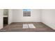 Comfortable bedroom with neutral carpeting, a window, and easy access to the bathroom at 635 W Pintail Dr, Casa Grande, AZ 85122