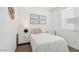 Bright bedroom with a comfortable bed, white walls, and natural light at 636 W Freedom St, Florence, AZ 85132